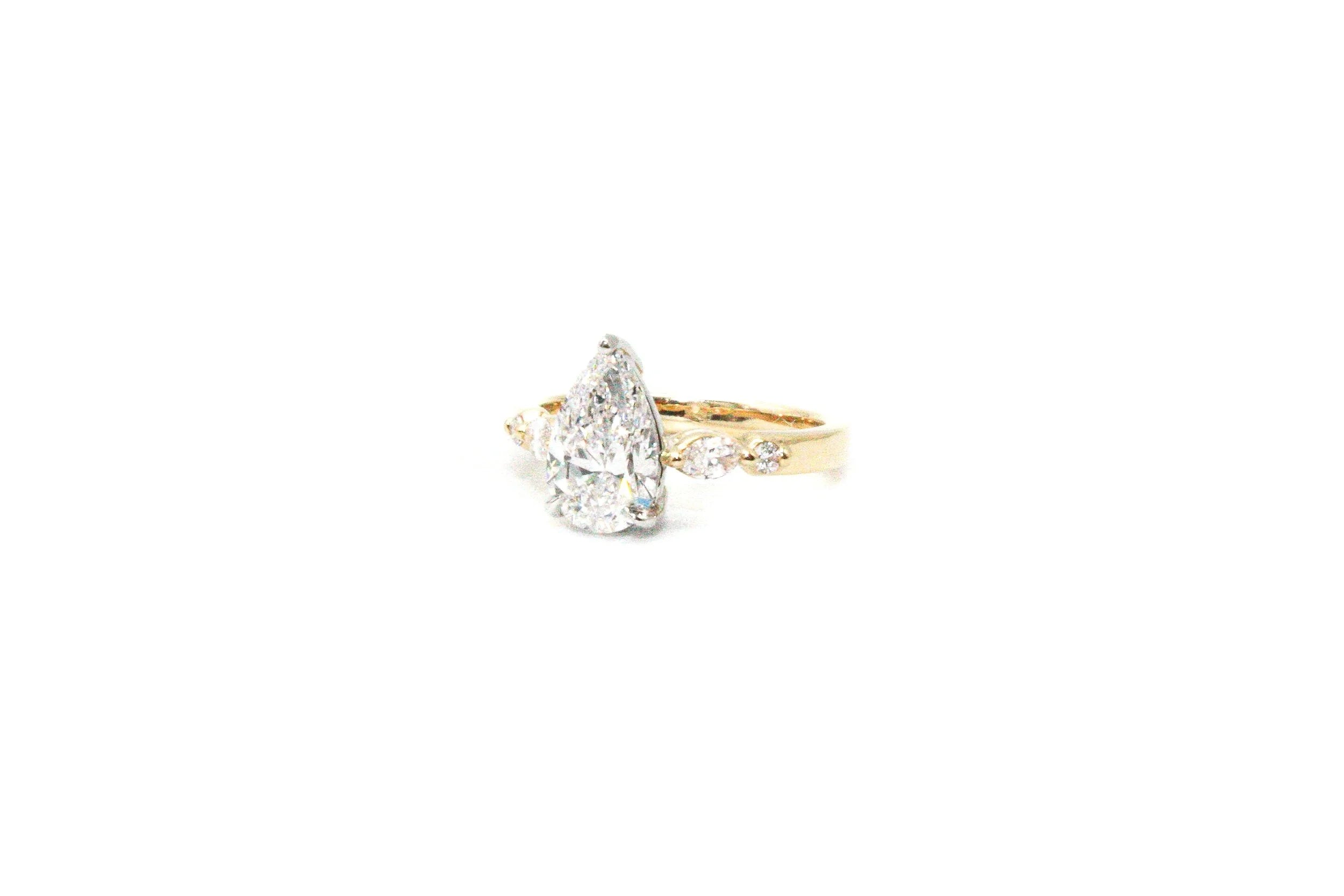 Pear Center Engagement Ring