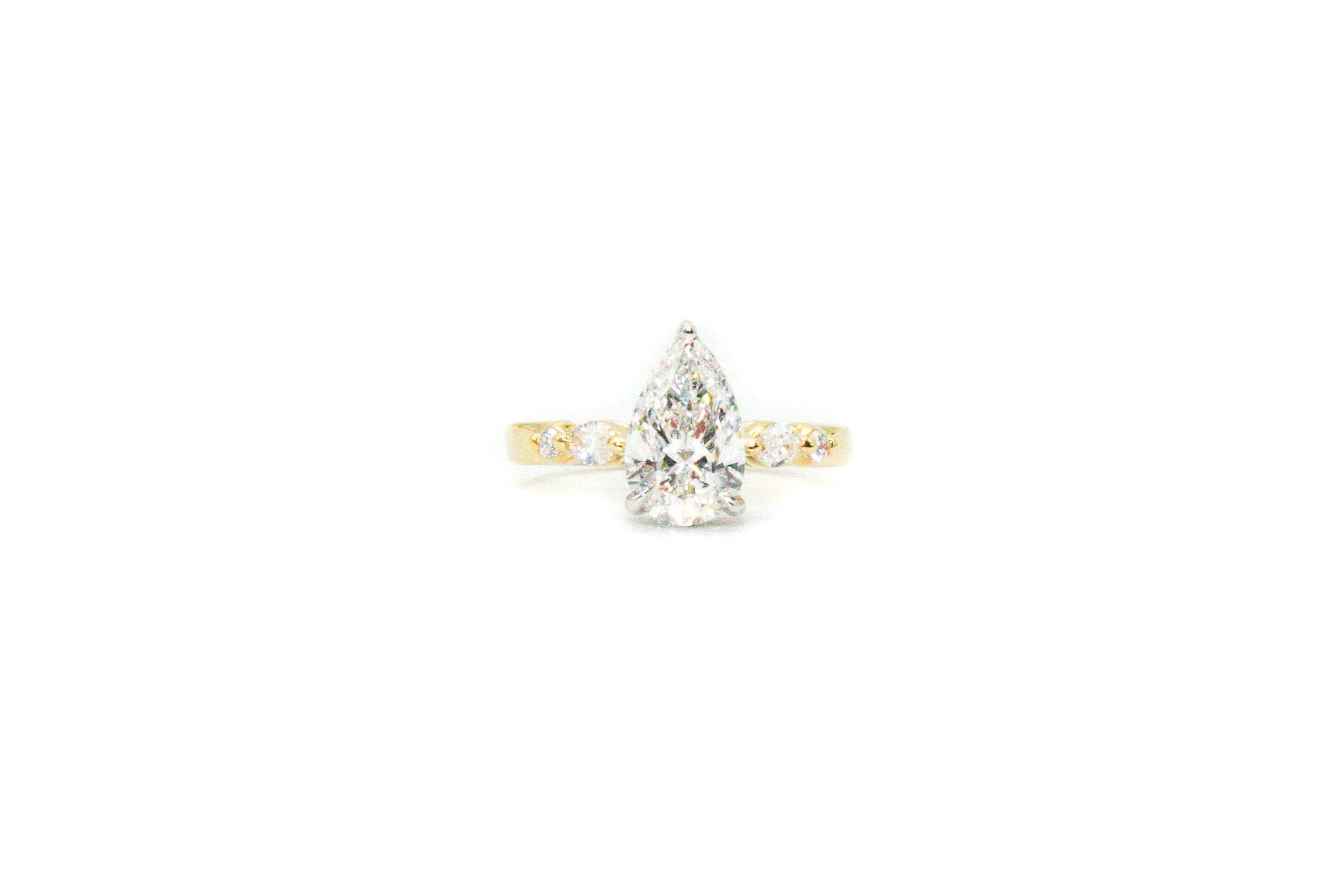 Pear Center Engagement Ring