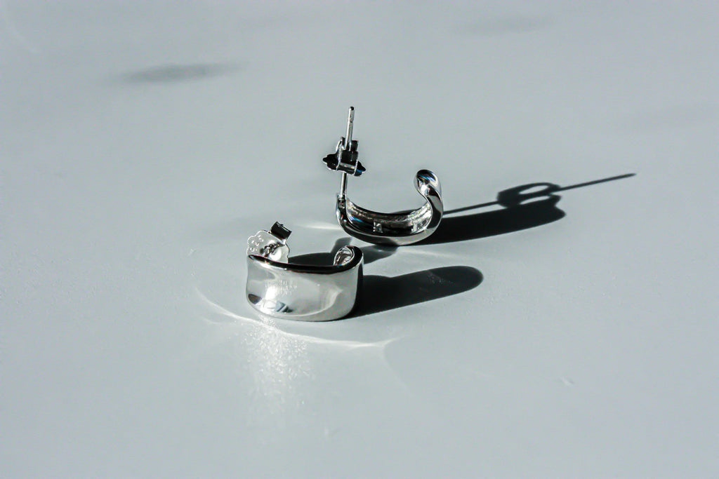 J Curve Earrings
