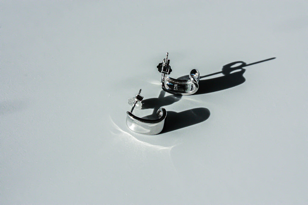 J Curve Earrings